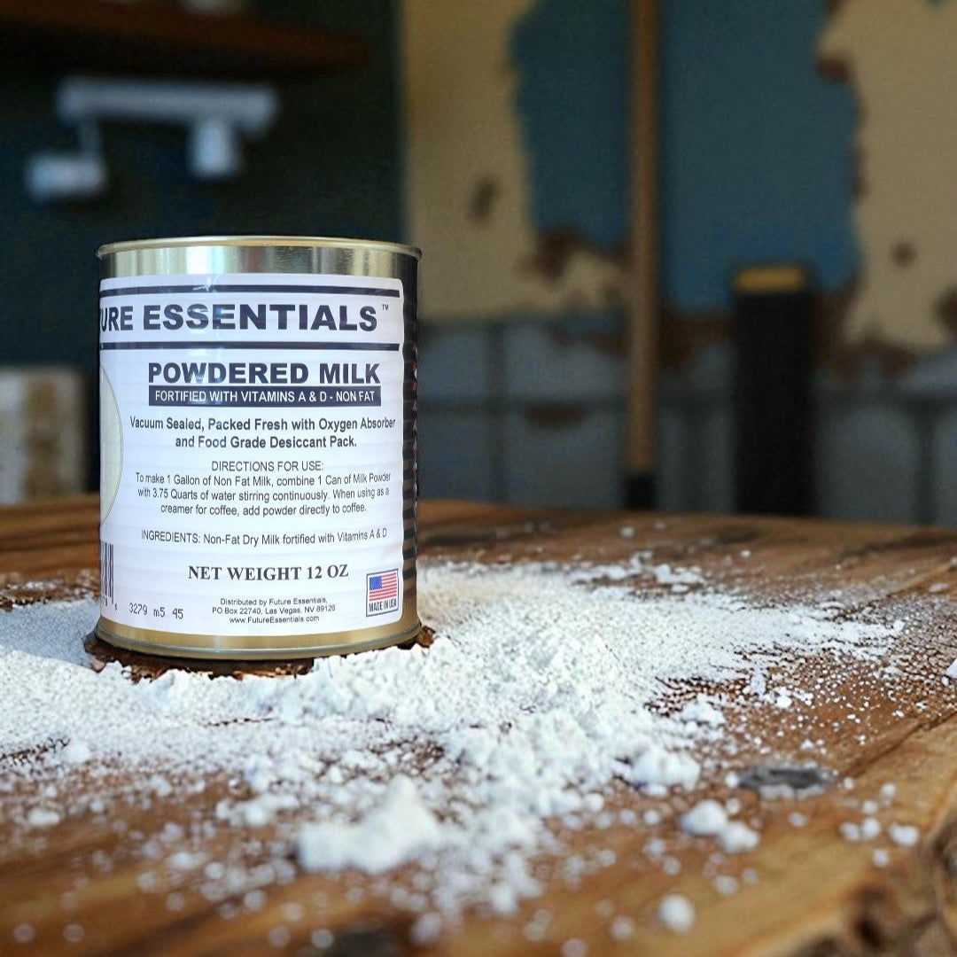 Can of powdered milk labeled 'Essentials' on a wooden surface with scattered powder.